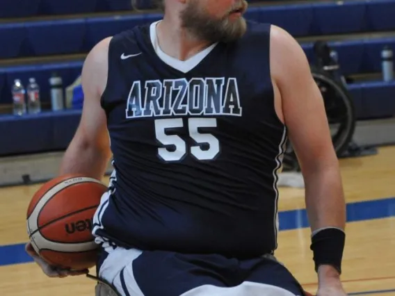 Karl Yares ready to pass a basketball.