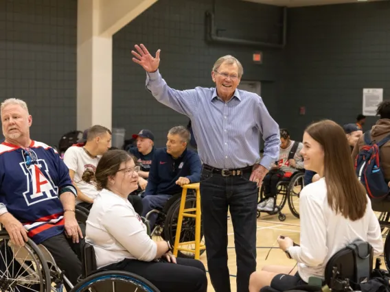 Jim Click waving hello at UA student athletes