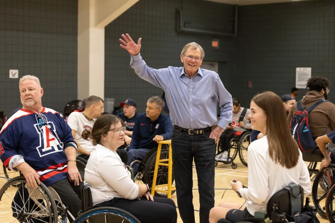 Jim Click waving hello at UA student athletes